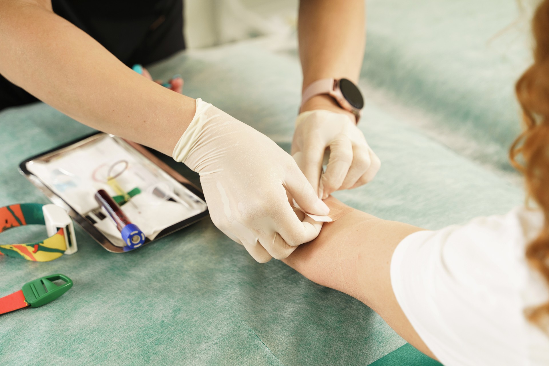 Nurse collecting patient's blood sample for test or donation